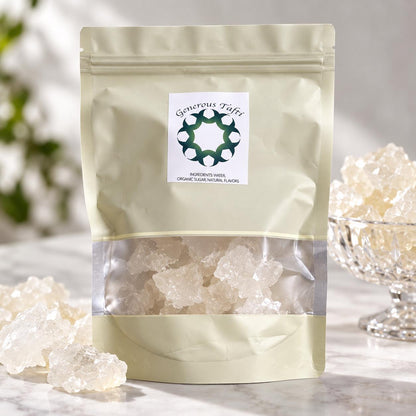 Green stand-up pouch with a clear window showing white rock candy crystals